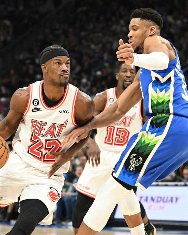 Miami heat forward Jimmy Butler tries to score against Milwaukee Bucks forward Giannis Antetokounmpo
